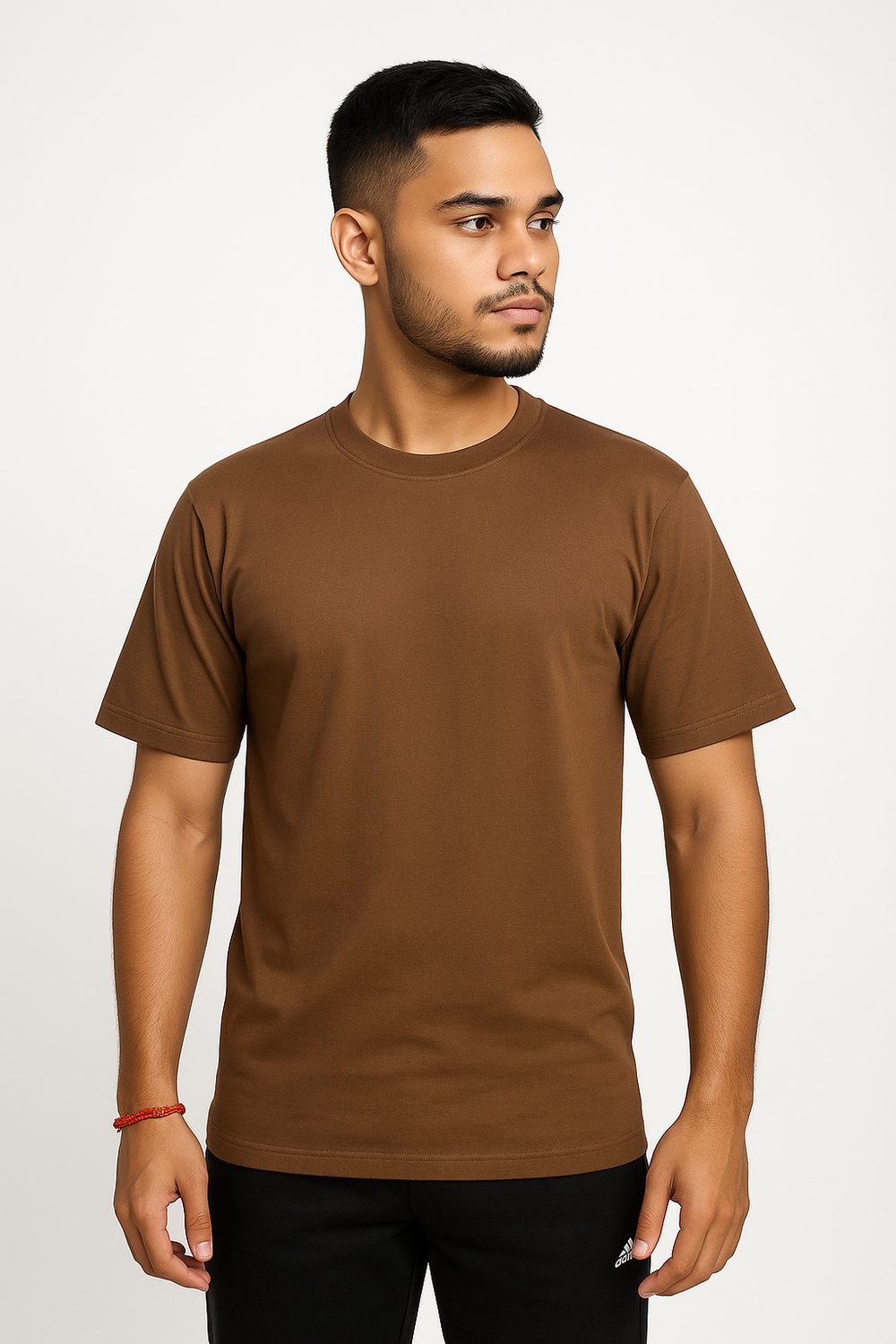 Man wearing a brown t-shirt on a white background