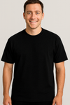 Man wearing a black t-shirt against a plain background