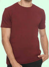 Maroon t-shirt worn by a person on a light green background