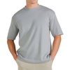 Person wearing a gray t-shirt on a white background